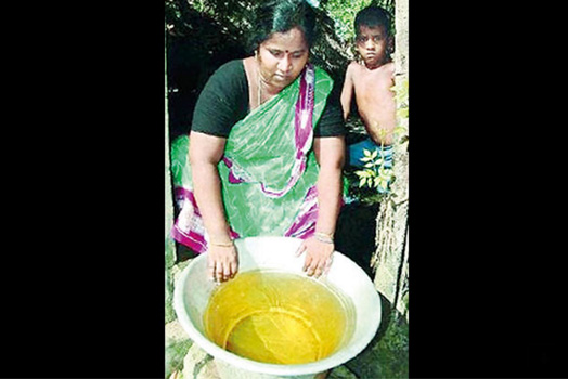 Picture of resident with contaminated water