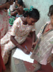 Villagers signing petition