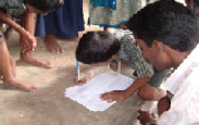 Villagers signing petition